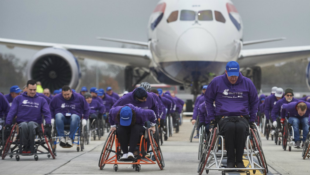 Record-breaking wheelchair team pulls plane at Heathrow to help disabled flying charity