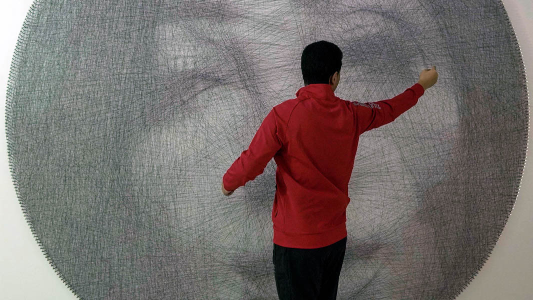 Iraqi artist creates largest pin and thread art for vitiligo awareness 