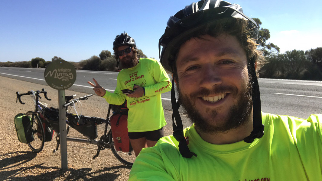 Doctors pedal more than 28,000 km to circumnavigate the globe on a tandem