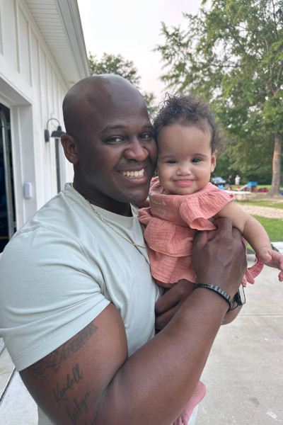 Lavareis holding his daughter