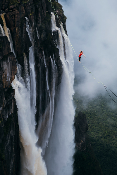 someone walking across the slackline