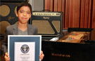 Ethan Bortnick Receives His Official Certificate as the Youngest Musician to Headline a Solo Concert