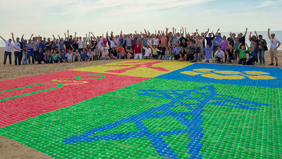 RWE Consulting employees create largest drink umbrella mosaic at team-building event in Netherlands