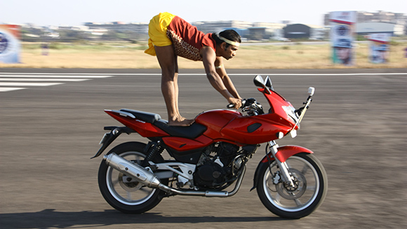 Video Classics: Indian teacher sets record performing yoga on moving motorcycle