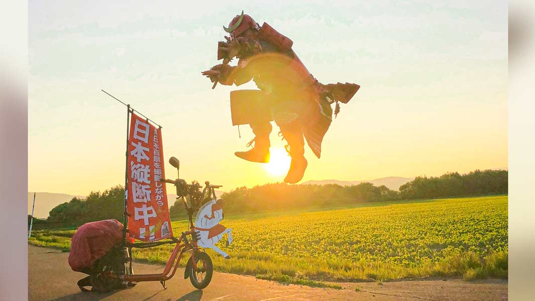 Riding the length of Japan on a scooter: why a red samurai has embarked on an 8,000-km journey
