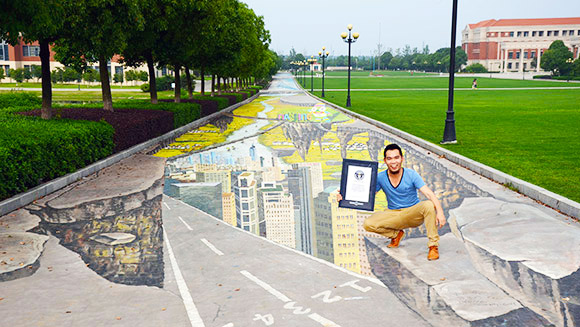 In pictures: Incredible 3D street art sets anamorphic painting records in China