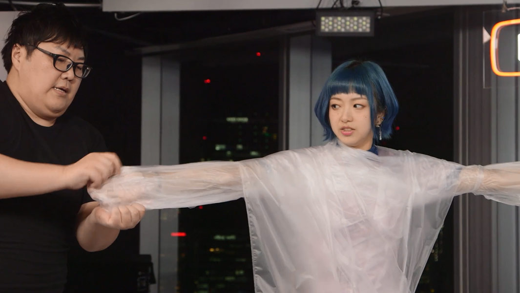 Japanese YouTuber wraps person in cling film at blistering speed to set GWR Day record