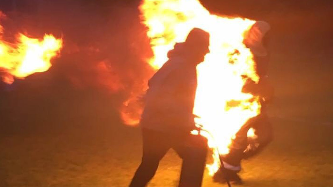 Stuntman sets himself on fire then smashes two records in daring run