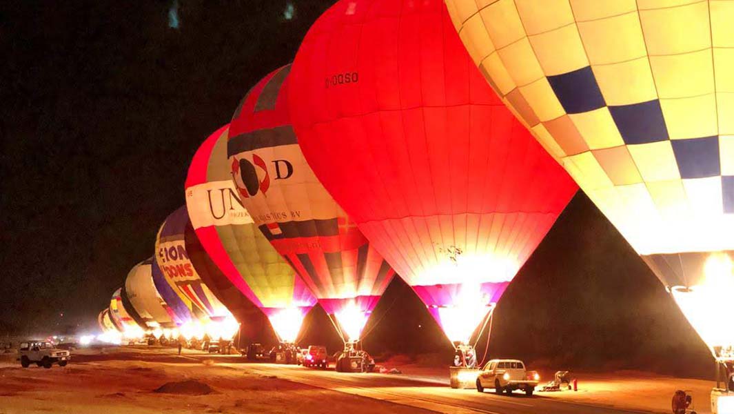 100 hot air balloons light up the skies of AlUla for spectacular glow show