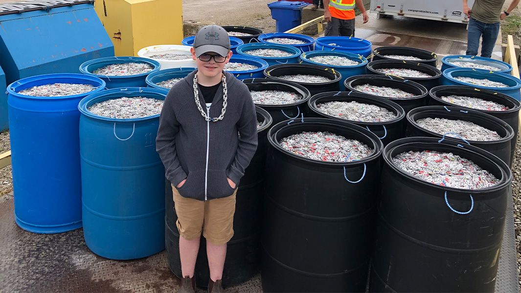 10-year-old kid shares wise words as he earns record for recycling drink can tabs