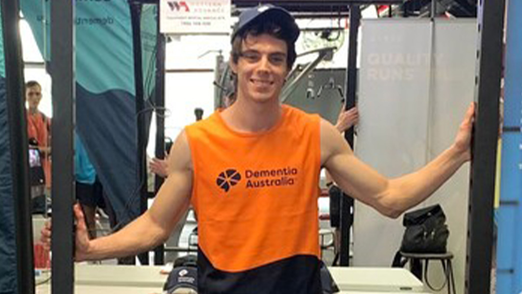 Fitness fanatic smashes pull ups record to raise thousands for charity