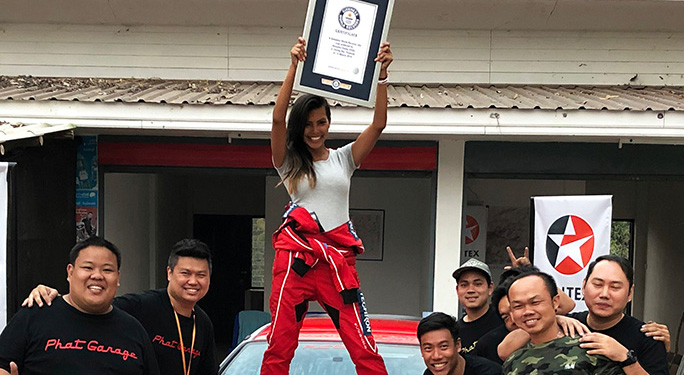 Natasha celebrates with certificate