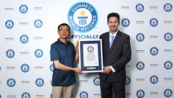 Rowan Simons and Dr. Yang Guangwen Fastest computer record