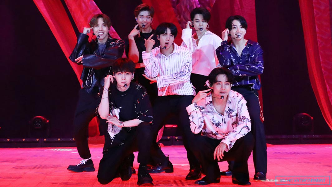 BTS close up with pink background during the Bang Bang Con Live live stream