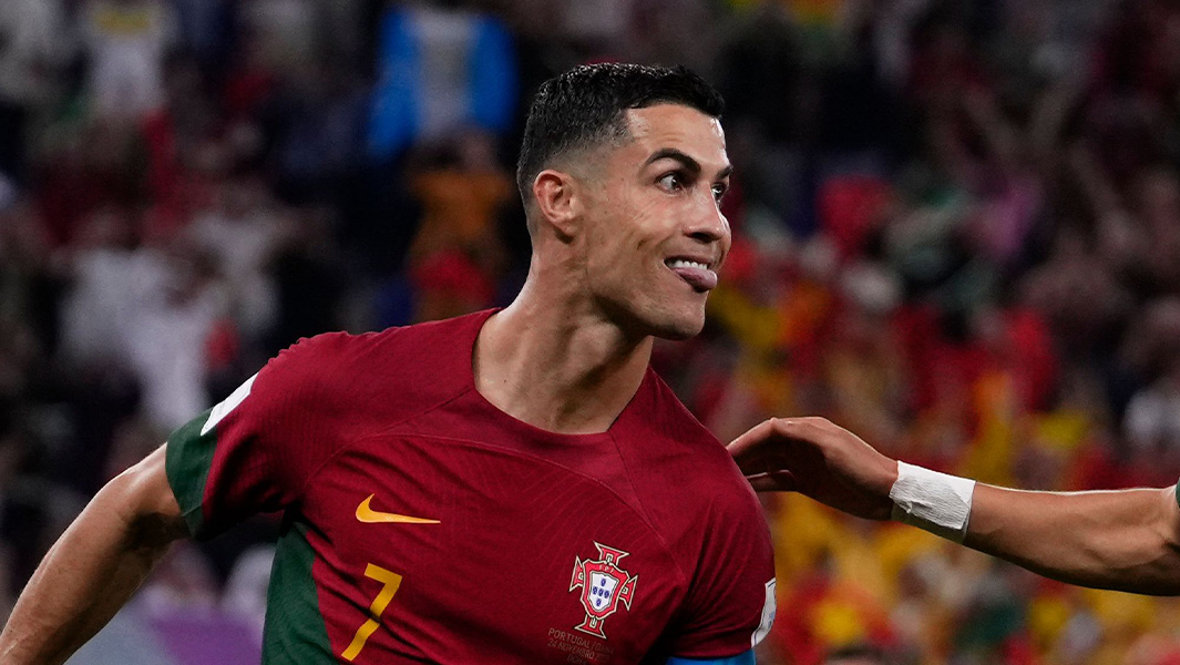 cristiano Ronaldo sticking his tongue out while celebrating after scoring against Ghana at World Cup