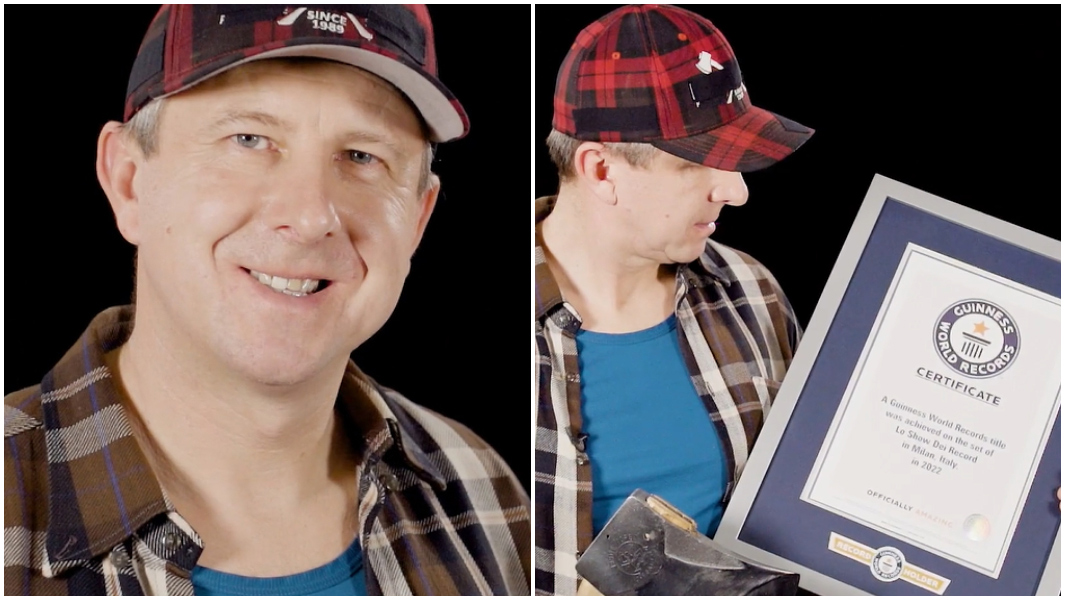 Martin Komarek smiling and holding certificate split header