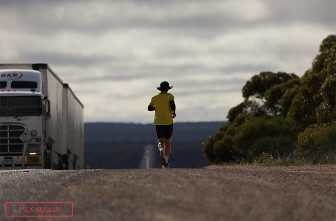 Chris runs past the truck