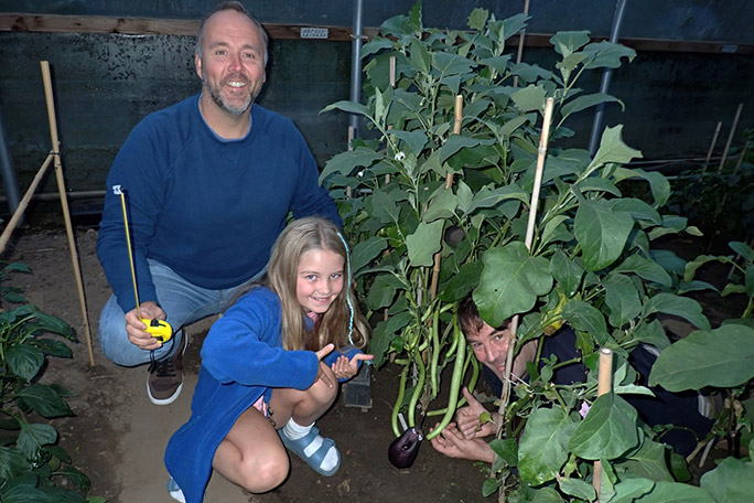 longest aubergine cultivated by eight year old Dasha Edwards, Chris Fowler and Kevin Fortey