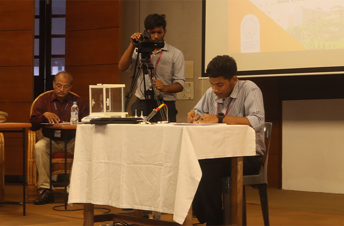 Smallest washing machine creator Sebin being filmed