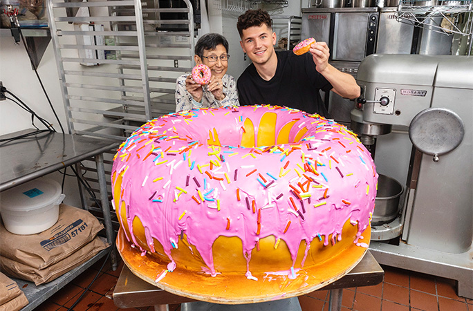 Nick and Lynja with the largest doughnut cake