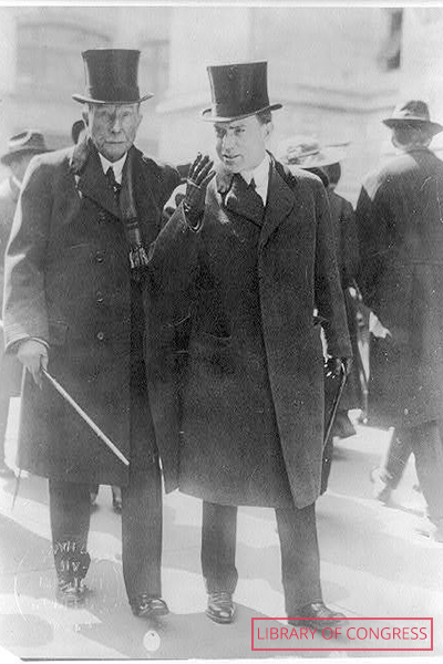 Rockefeller and his son walking together