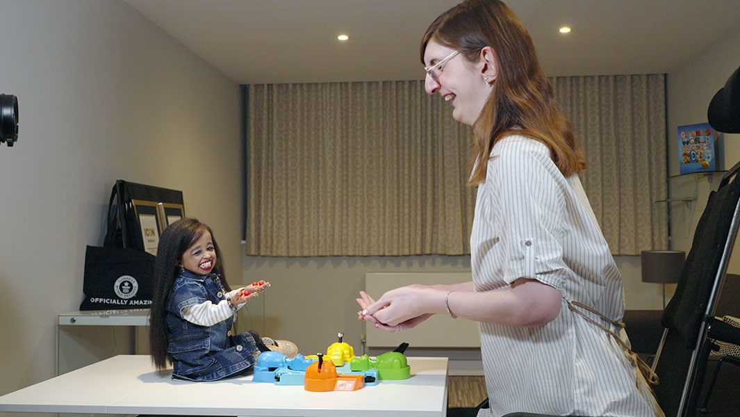 Split image of Jyoti and Rumeysa playing Hungry Hungry Hippos