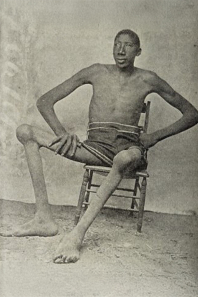 John Rogan sitting in a chair