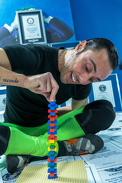 Silvio Sabba stacking Lego and smiling