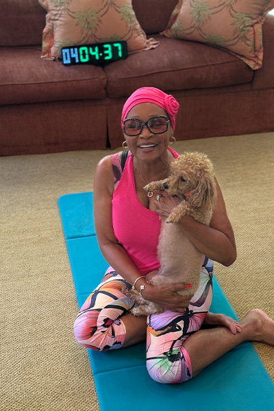 Annie posing with her dog Carmen