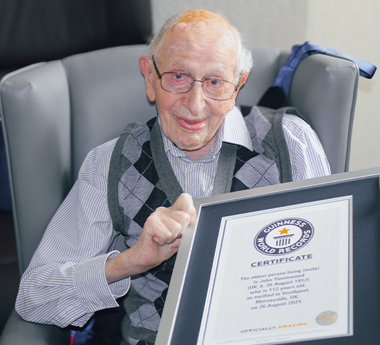 John Tinniswood holding his GWR certificate