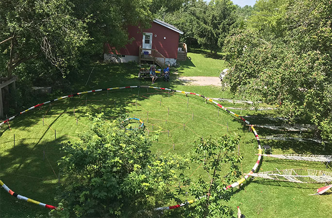 The dreamcatcher laid out on the ground