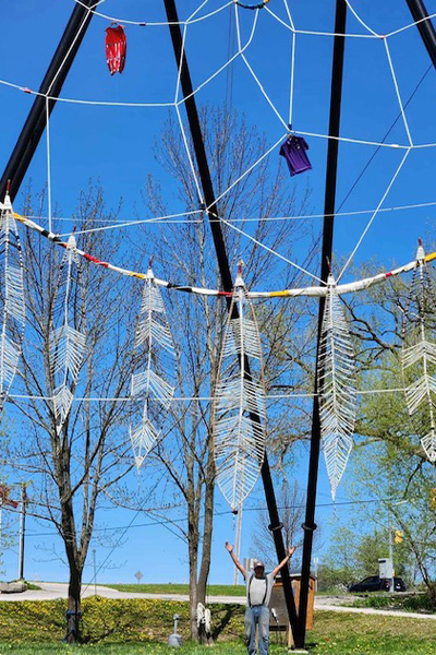 Bobbie posing underneath the dreamcatcher