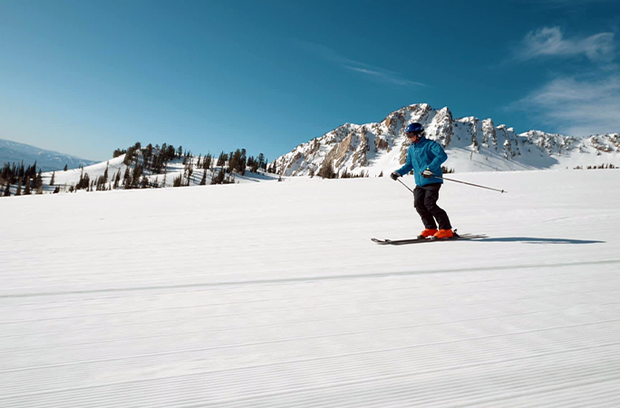 Racer Tom skiing downhill