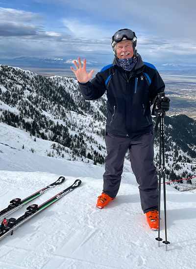 Tom standing atop a ski slope