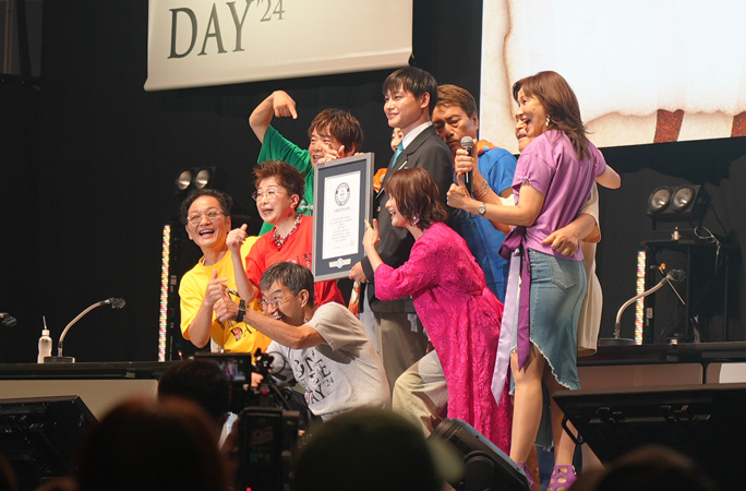 Voice casts of One Piece gather around the Guinness World Records official certificate