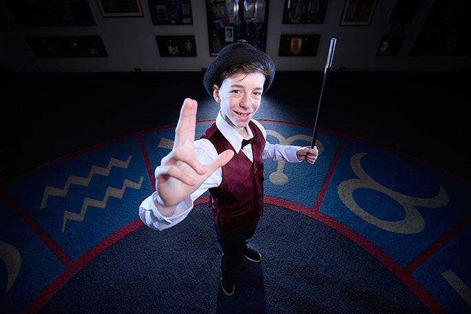 Cillian smiling and looking at camera