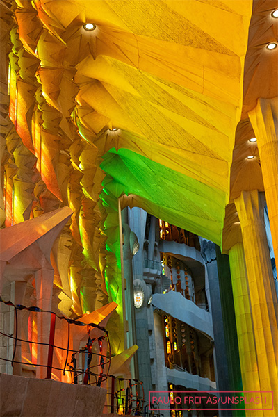 The colorful ceiling inside La Sagrada Familia