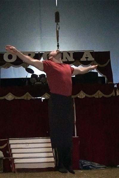 Leonardo hanging by his teeth