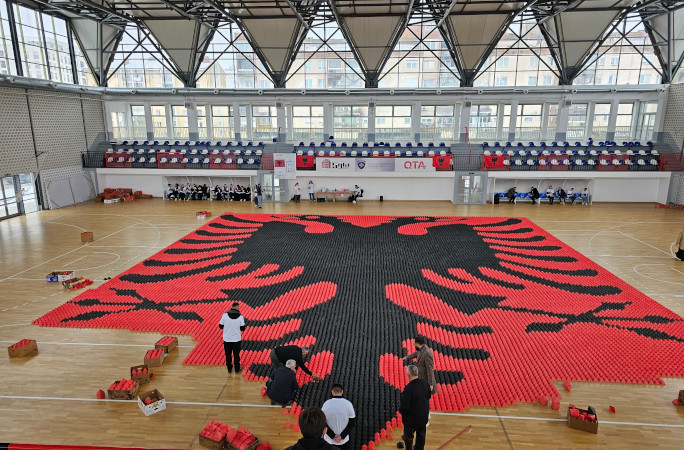 Red and white origami pyramids in the shape of the Albanian flag