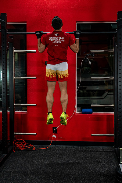Tommy doing burpee pull ups