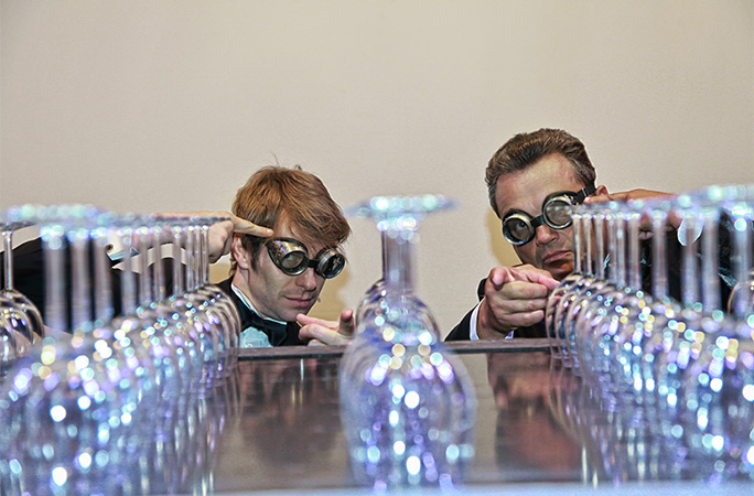 Walter Rolfo and his partner prepare to break wine glasses with their minds