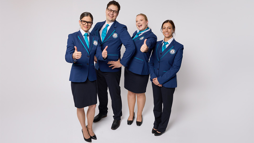 4 Guinness World Records Adjudicators modelling the new uniform
