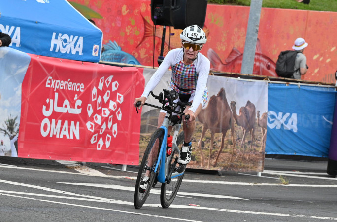Natalie biking down the road
