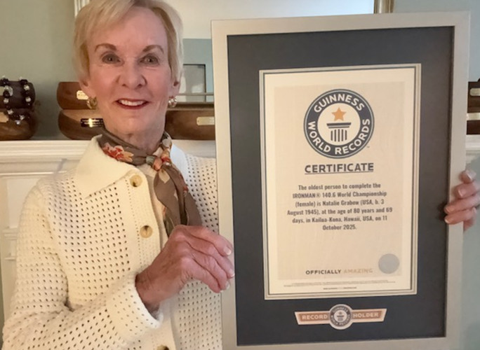 Natalie holding her GWR certificate
