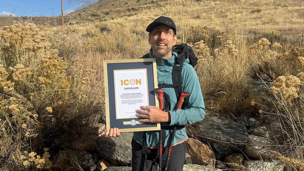 erik-weihenmayer-climbing-lhotse-with-GWR-ICON-certificate-and-rock-climbing-red-tower