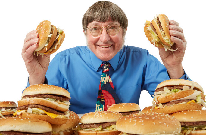 Donald Gorske smiling and holding a Big Mac