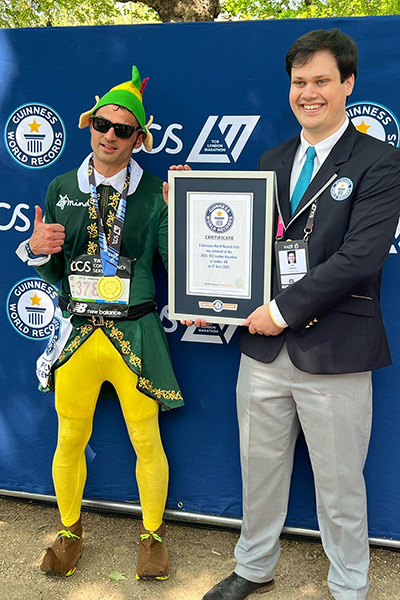 Fastest marathon dressed as an elf with sunglasses