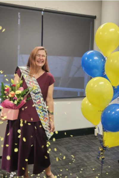 Liesl winning her record at work