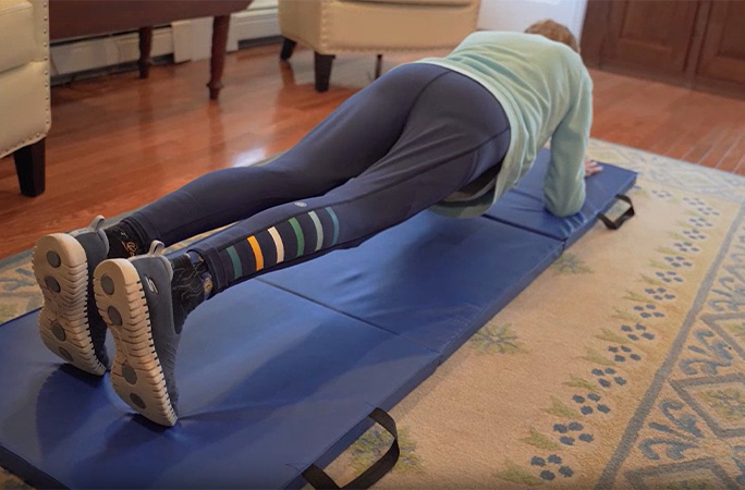 Sarah planking from behind