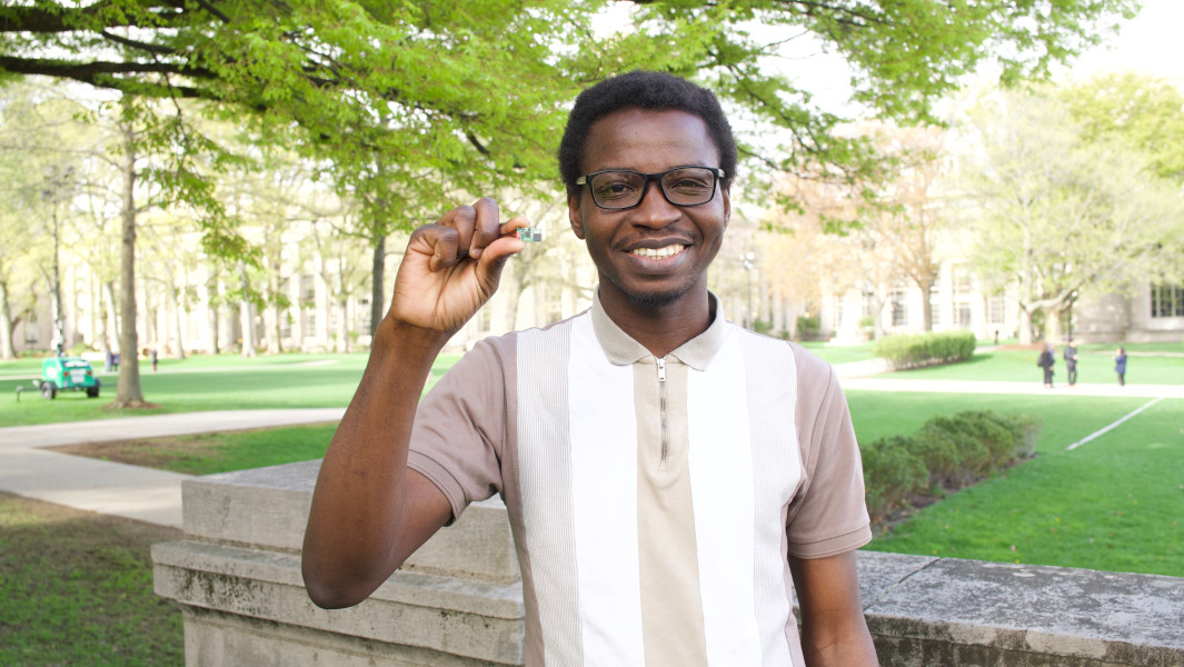 Tobi holding his tracking device